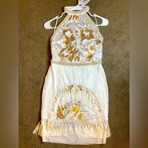 ‘Like Gold Dust White Sequin Fringe Dress’ from 12th Tribe